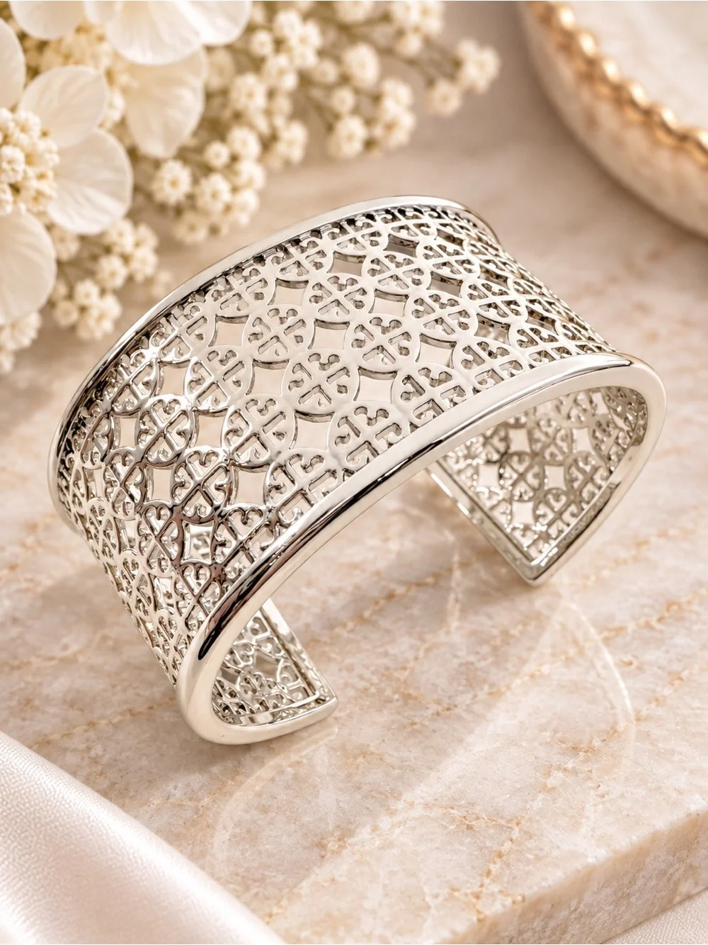 Tory Burch Miller logo cuff bracelet in silver.